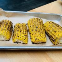 Grilled Corn · Sea salt and butter.
