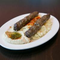 KEFTA PLATE · Minced beef and lamb mix grilled over an open flame, sautéed onions and red peppers and humm...