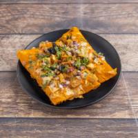 Braised Chicken Enchilada Suizas · Roasted tomato cream sauce, house cheese blend, tortilla strips, crumbled pasilla chilis, re...