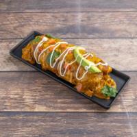The Supernatural Burrito · A choice of meat served with arbol sauce, red onions, roasted corn, poblano peppers, black b...