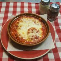 Roma's Combo · Our combination plate of ravioli, lasagna and manicotti.
