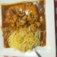 Chicken Roma's · Sauteed chicken breast with mushrooms in marsala wine cream sauce. Comes with spaghetti pasta.