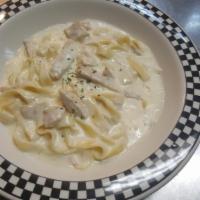 Chicken Fettuccini Alfredo · Sauteed chicken diced and tossed with fettuccini noodles in creamy Alfredo sauce. Comes with...