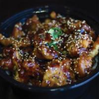 Sesame Chicken Bowl · Served with teriyaki sauce. Comes with rice and Tempura Chicken.