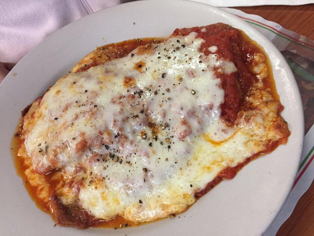 Eggplant Parmigiana · Served with either spaghetti with tomato sauce, or soup or salad.