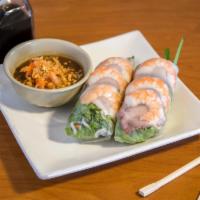 2 Shrimp and Pork Spring Rolls · Fresh sliced shrimp and pork spring roll wrapped in rice paper with green salad, mint, bean ...
