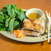 5 Fried Pork Eggrolls · Crispy fried rice paper rolled with pork served with green salad, mint, pickled daikon, cucu...