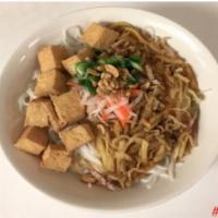 Tofu and Taro Bowl · Crispy tofu and seasoned julienne taro with vermicelli noodles, green salad, mint, bean spro...