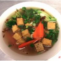 Rice Noodle Vegetarian Soup · Rice noodles vegetable based soup with tofu, bok choy, broccoli, carrots, onion and cilantro.