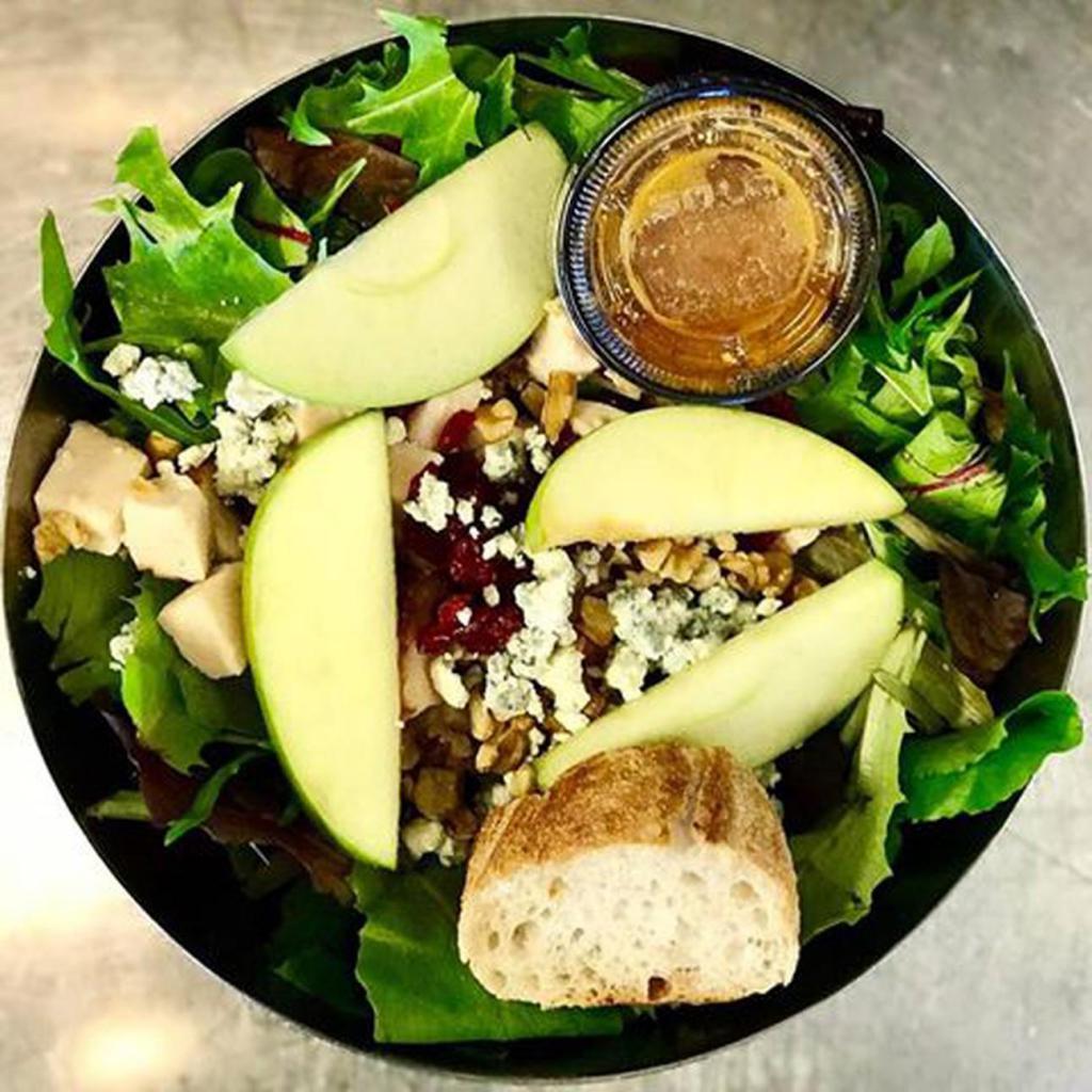 Cran-Apple with Blue Cheese Salad · Mixed greens, oven-roasted chicken breast, Granny Smith apples, dried cranberries, blue cheese and walnuts with our very own cran-apple vinaigrette.