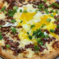 Sunny Side Up Pizza · Roasted Garlic and EVOO, Applewood Smoked Bacon, Two Eggs “Sunnyside Up,” House Cheese Blend...