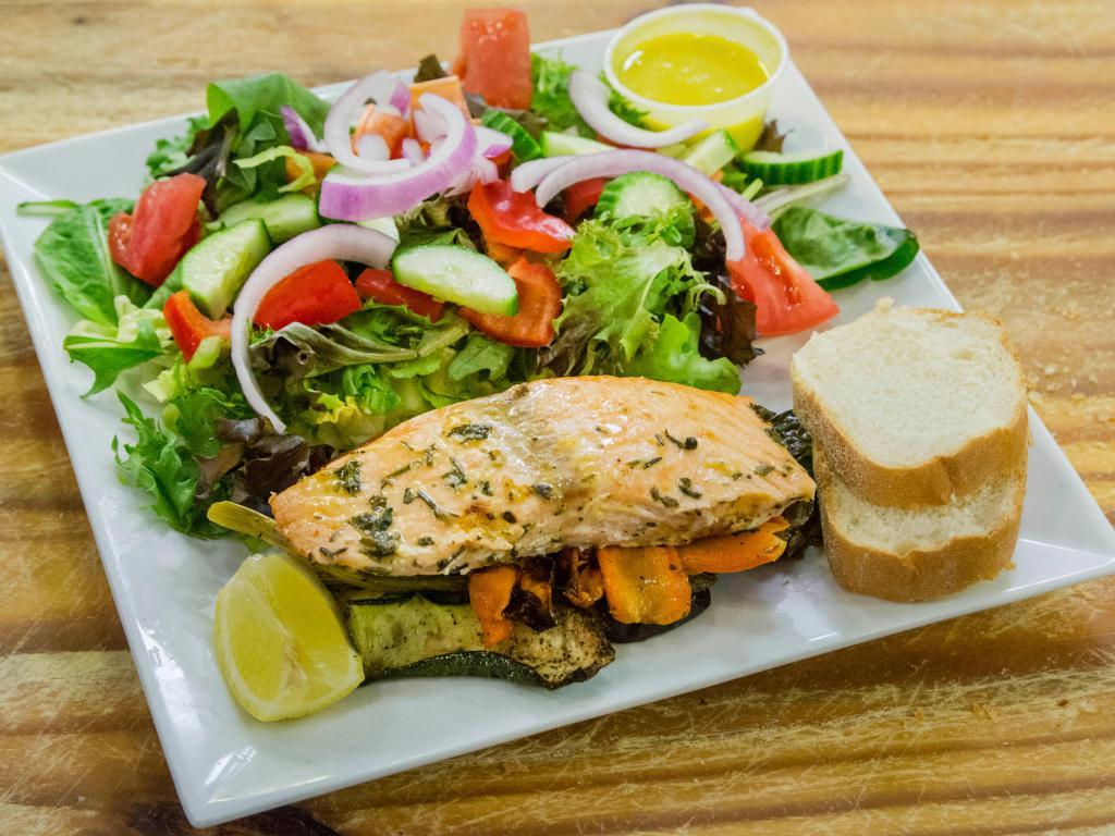 Fresh Salmon Salad · Mixed Greens, Grilled Vegetable, Fresh Salmon, Cucumber, Tomato, Red Onion, Tomatoes. Served with mustard citrus dressing and bread.
