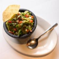Jefe's Guacamole Dip · Fresh avocados tossed with diced tomatoes, onions, cilantro, squeezed lime juice, and a touc...