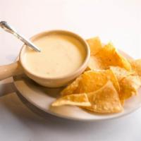 Jefe Queso Dip · Creamy melted White American cheese mixed with a hint of jalapeños to spice it up for a perf...