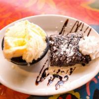 Valeria's Brownie Delight · Warm chocolate fudge brownie topped with vanilla ice cream, chocolate & caramel drizzle.