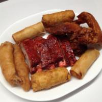 Assorted Appetizer · 4 BBQ ribs, 2 fantail shrimps, 2 chicken wings, 2 vegetable rolls and 2 egg rolls.