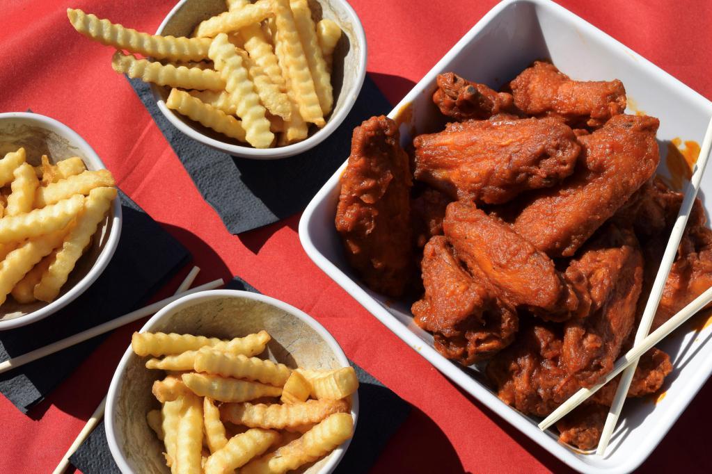 20 Wing Special · 20 Wings. 4 Flavors. Large Fries. 2L Soda or Gallon Tea