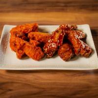 20 Wings · 20 boneless or traditional wings with choice of four sauces.