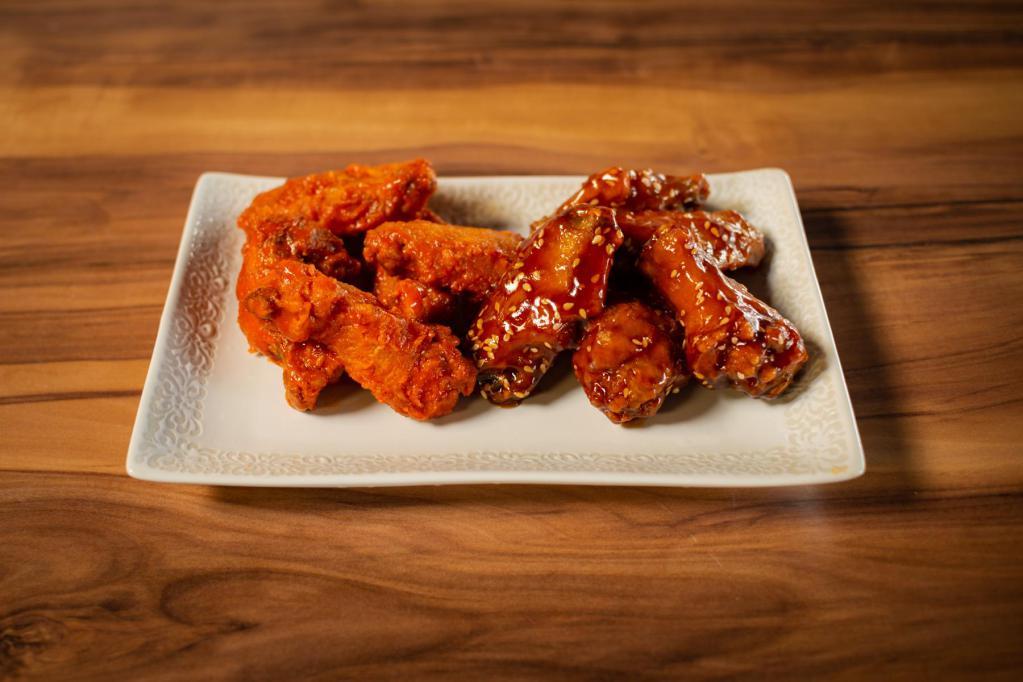 20 Wings · 20 boneless or traditional wings with choice of four sauces.