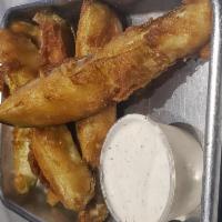 Fried Pickles · Hand battered and deep fried pickle spears