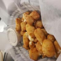 Cheese Curds · Lightly battered cheese curds directly from Wisconsin
