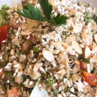 Quinoa Salad · Organic quinoa tossed with fresh diced tomatoes, cucumbers, finely diced green onions, chopp...