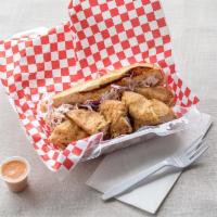 Fried Chicken Po'boy Sandwich · Winnah, winnah - Fried Chicken Po'boy for dinner. Breaded fried chicken chunks, topped with ...