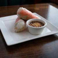7. Summer Roll · Shrimp. Rice paper roll served with vegetables.