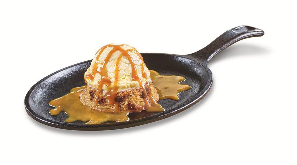Signature Panookie · Warm chocolate chip cookie filled with molten chocolate and topped with premium vanilla ice cream and salted caramel.