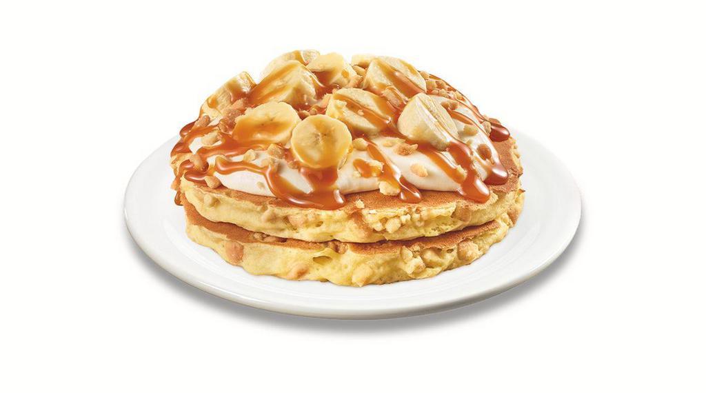 Stack of Salted Carmel & Banana Cream Pancakes  · Buttermilk pancakes cooked with shortbread
pieces and topped with vanilla cream, bananas,
more shortbread pieces and salted caramel. 