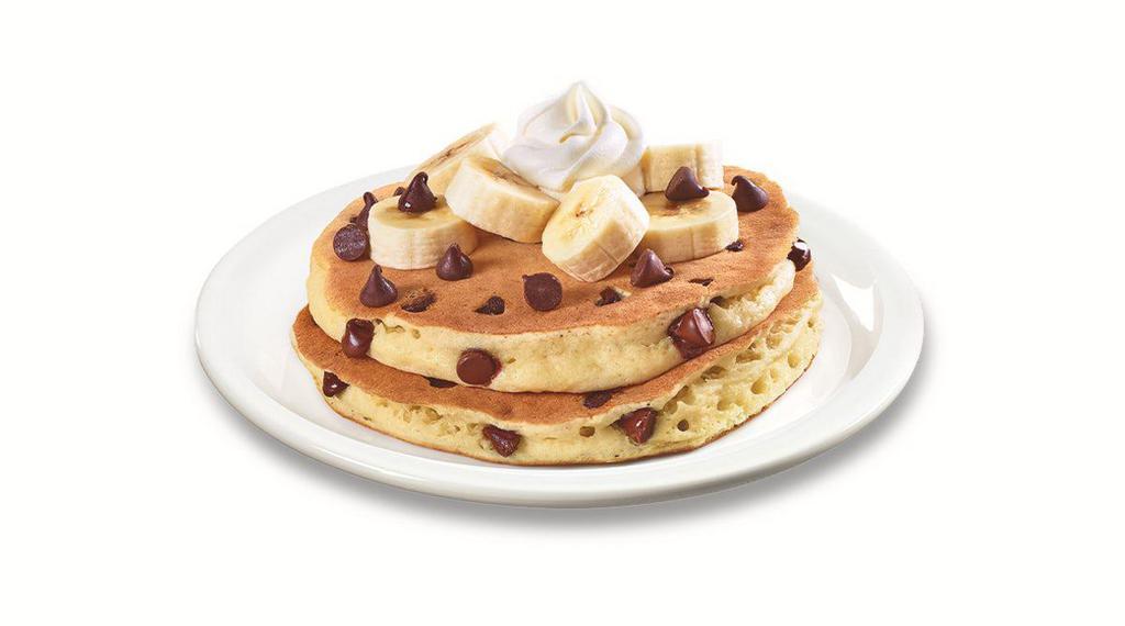 Stack of Choconana Pancakes  · Ghirardelli® chocolate chips cooked inside buttermilk pancakes. Topped with bananas, more Ghirardelli® chocolate chips and whipped cream. 