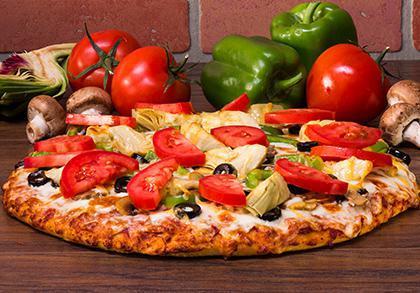Mt. Veggiemore · A Vegetarian Landmark! Loads of mushrooms, black olives, bell peppers, artichoke hearts and sliced fresh tomatoes on classic red sauce. - (90-310 cal./slice)