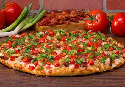 Chicken Club · Better than a BLT. Loaded with grilled chicken, crisp bacon, diced tomatoes and green onions on our creamy garlic sauce. - (150-390 cal./slice)