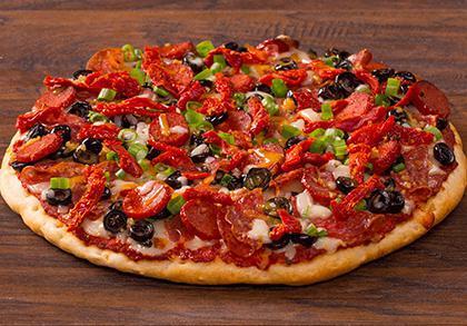 Garlic Tuscan · Louisiana Hot Sausage, salami, black olives, garlic, green onions and sun dried tomatoes on our classic red sauce. - (120-390 cal./slice)