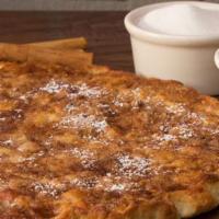 Cinnamon Dessert Pizza · Our fresh pizza dough covered in butter, brown sugar, cinnamon and topped with a dusting of ...