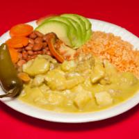 Pork Chile Verde · Pork cooked in a specialty Green Salsa with Potatos served with rice and beans and Corn Tort...
