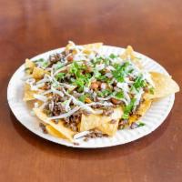 Compita's Nachos · Our Version of Nachos with your choice of any Meat we offer.