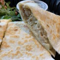 Quesadillas · Melted cheeses inside a flour tortilla and served with side of pico de Gallo and crema. Add ...