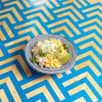 Esquite · Grilled corn kernels, lime aioli, cotija cheese, Chile lime, cilantro and crema. Vegetarian....