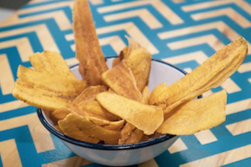 Plantain Chips · Vegan. Seasoned, crispy plantain chips