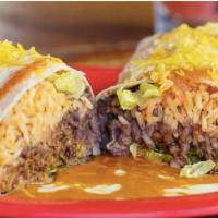 Gringo Burrito · Seasoned ground beef, rice, black beans, cheddar, lettuce, tomato, crema, queso fundido, and...