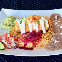 Pulled Chicken Chimichanga · Rice, refried beans, pico de gallo, guacamole and sour cream.