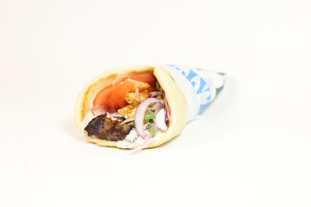 Beef and Lamb Gyro Pita · A seasoned beef and lamb mix, cooked on a vertical rotisserie, served on a warm pita bread filled with fries, tomatoes, onions and tzatziki sauce.