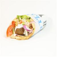 Falafel Pita Combo · Freshly made falafel served on warm pita bread filled with lettuce, tomatoes, onions, and tz...