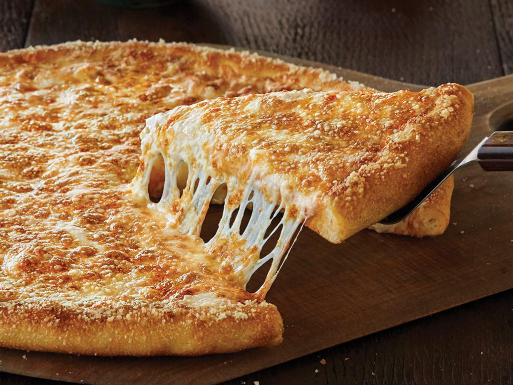 The Big Cheese Pizza · Our original sauce and signature three cheeses, plus cheddar and shaved parmesan, topped with our parmesan cheese crust topper