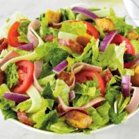 Italian Chef Salad Regular Size · Fresh-cut lettuce blend, ham, salami, provolone cheese, sliced tomatoes, red onions and crou...