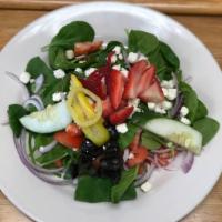 Spinach Salad · Fresh baby spinach, artichoke, tomatoes, roasted red peppers, mozzarella cheese, onions, sun...