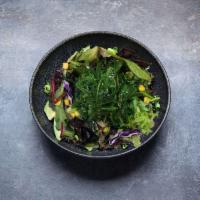 Seaweed Salad · Baby greens, kale, spring mix, cabbage, corn, and seaweed salad.