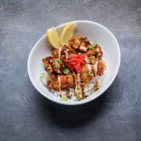 Chicken Karaage Rice Bowl · Deep-fried chicken, teriyaki sauce, spicy aioli, green onion, red ginger, and sesame seeds o...