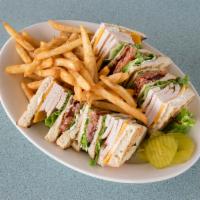 Club Sandwich · A triple-decker on toasted bread with mayonnaise, turkey, bacon, cheddar cheese, lettuce and...